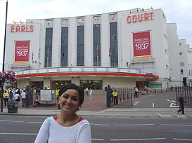 Ana  Soriano in front of the Earls Court Hall in London