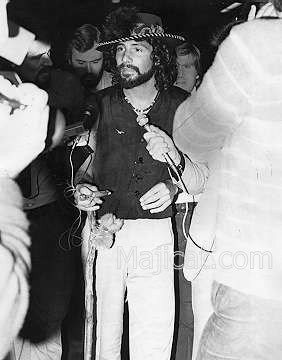 Cat Stevens in feathered hat
